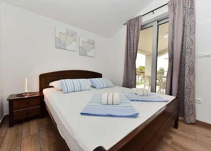 Apartmani Iva Апартаменты *